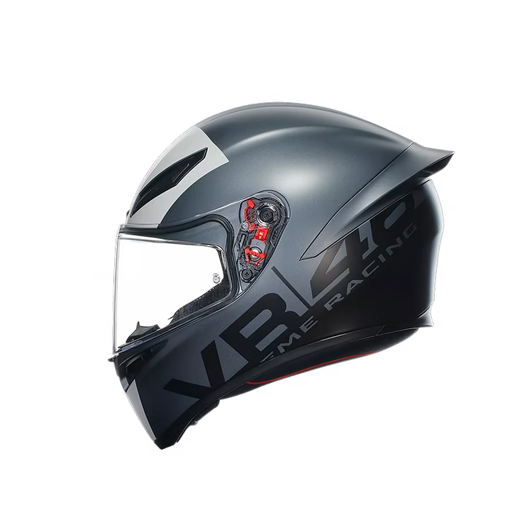 Gray motorcycle helmet with clear visor on a white background