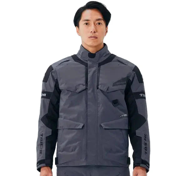 Person wearing a gray and black jacket with visible branding on a white background - Eagle Gray